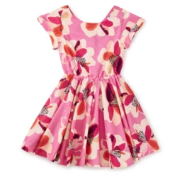 BUTTON BACK SKIRTED DRESS IN FLORAL BURST